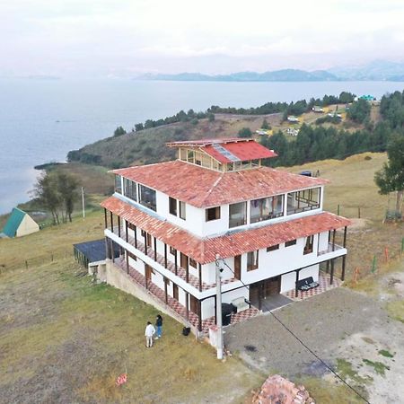 Hotel Tota Eliseo Playa Blanca Lago De 托塔 外观 照片
