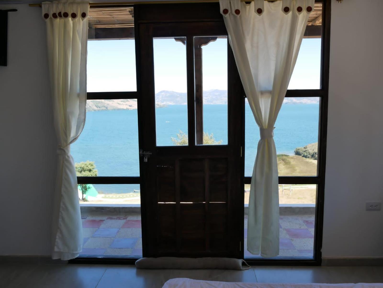 Hotel Tota Eliseo Playa Blanca Lago De 托塔 外观 照片