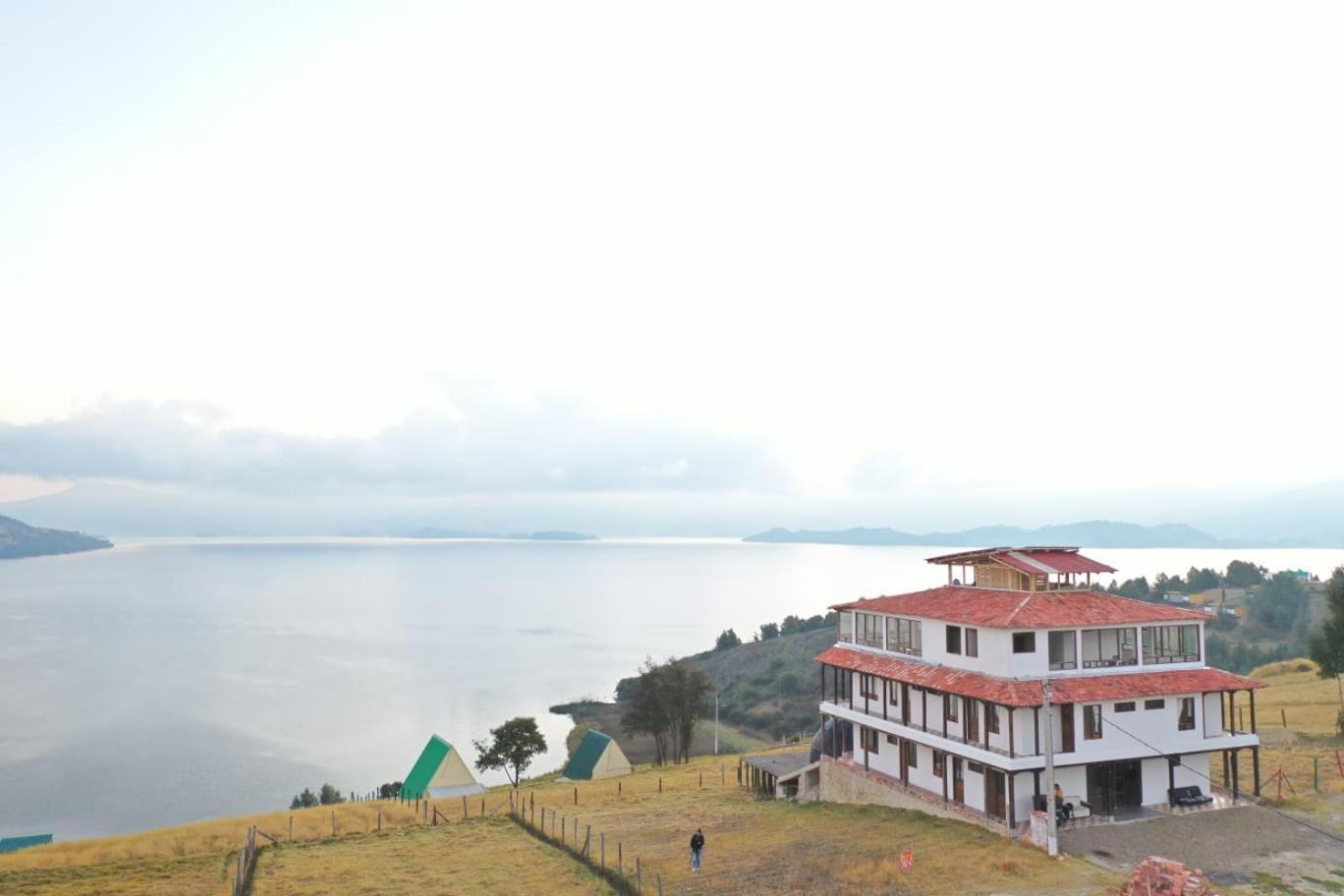 Hotel Tota Eliseo Playa Blanca Lago De 托塔 外观 照片