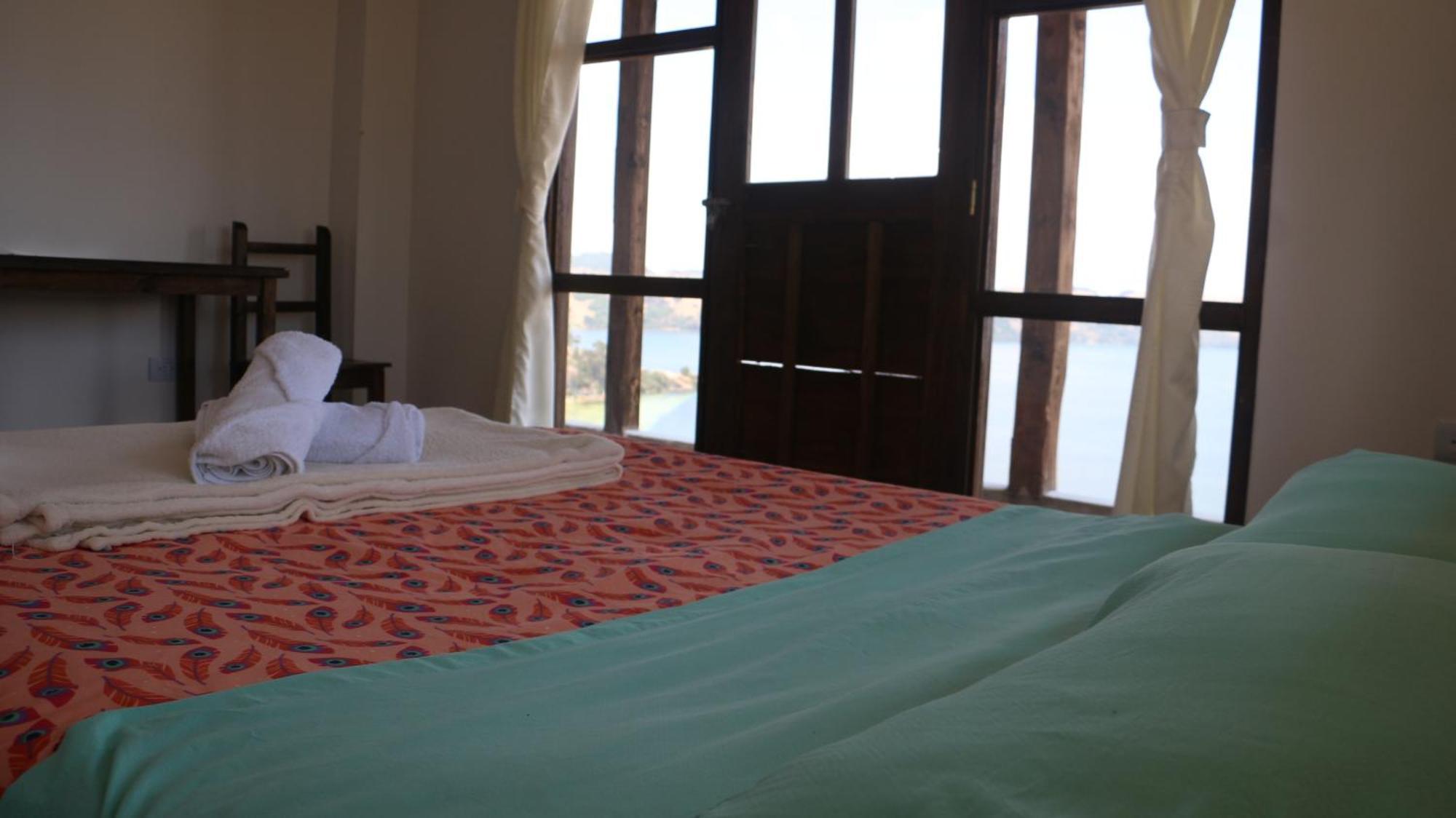 Hotel Tota Eliseo Playa Blanca Lago De 托塔 外观 照片