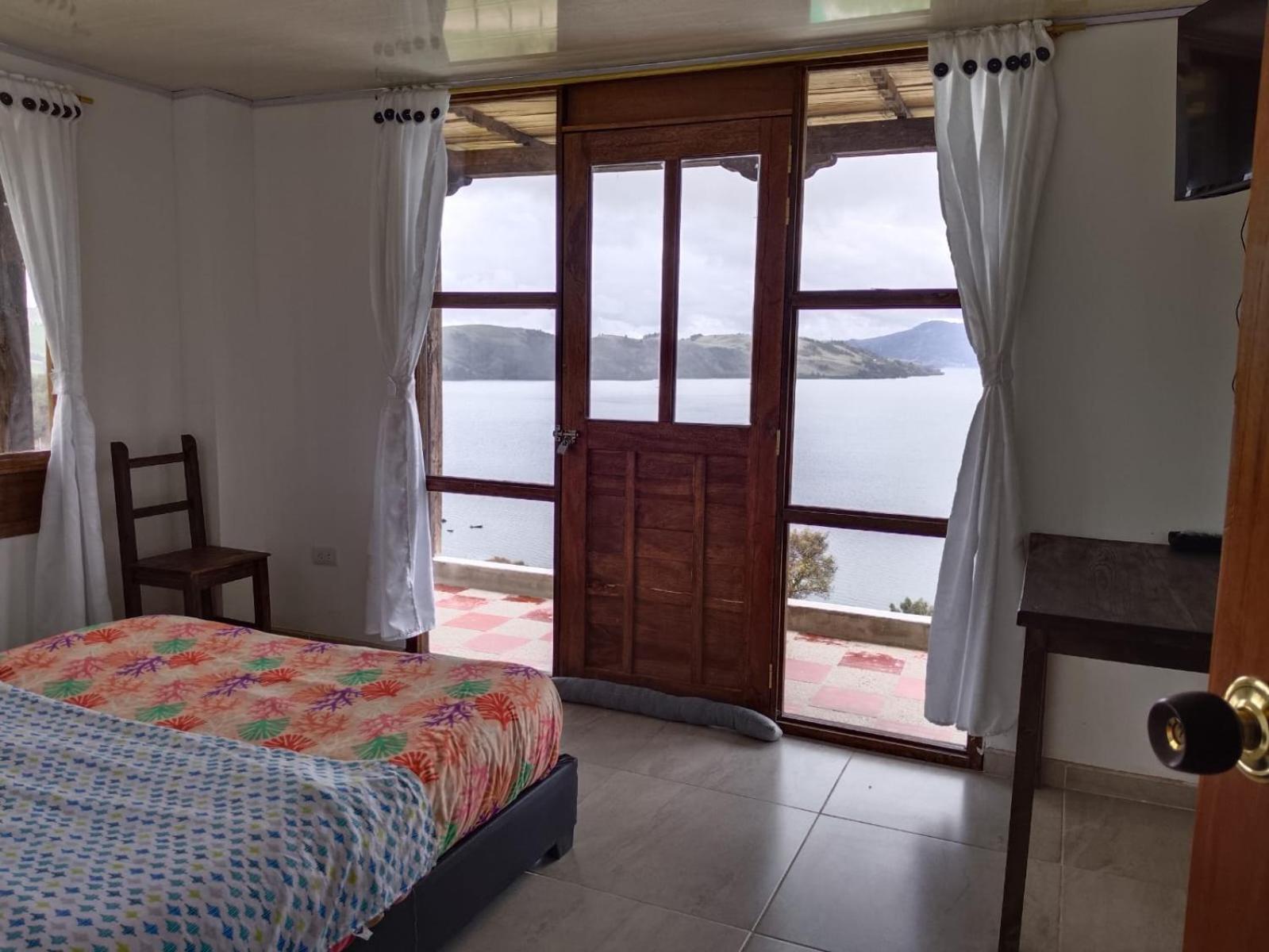 Hotel Tota Eliseo Playa Blanca Lago De 托塔 外观 照片