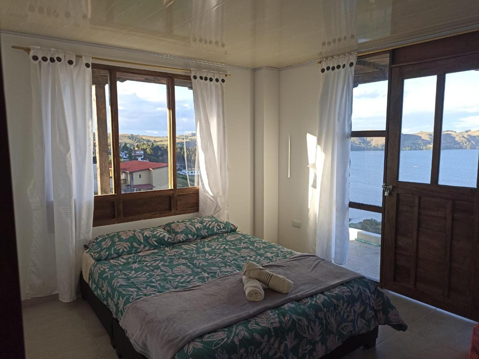 Hotel Tota Eliseo Playa Blanca Lago De 托塔 外观 照片