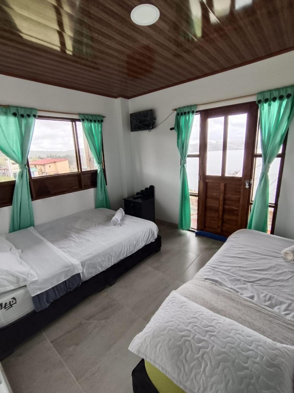 Hotel Tota Eliseo Playa Blanca Lago De 托塔 外观 照片