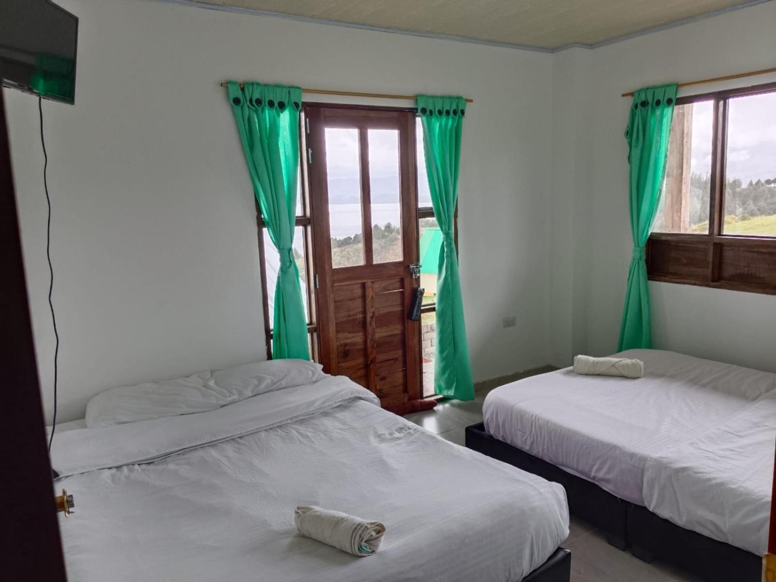 Hotel Tota Eliseo Playa Blanca Lago De 托塔 外观 照片